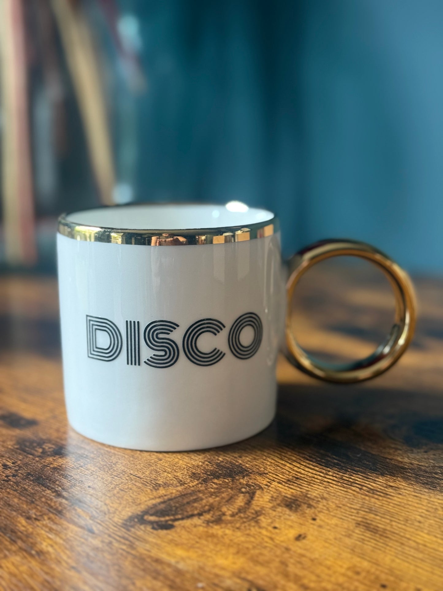 „Disco in a Cup“ weisser Disco Kaffee- bzw. Teebecher mit Goldrand